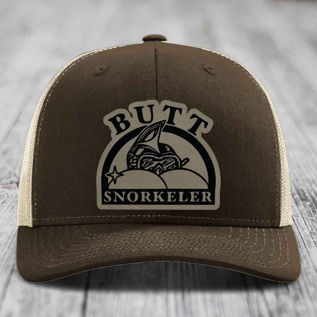 Brown trucker hat with beige mesh back and &