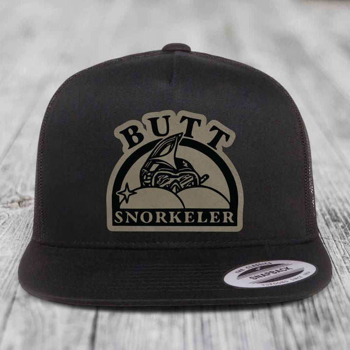 Butt Snorkeler - Leather Patch Hat - Light Brown to Black Patch - Yupoong 6006 Snapback Flatbill Hat