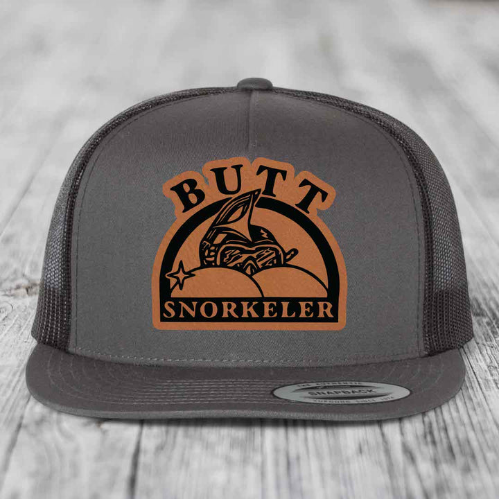 Butt Snorkeler - Leather Patch Hat - Rawhide to Black Patch - Yupoong 6006 Snapback Flatbill Hat