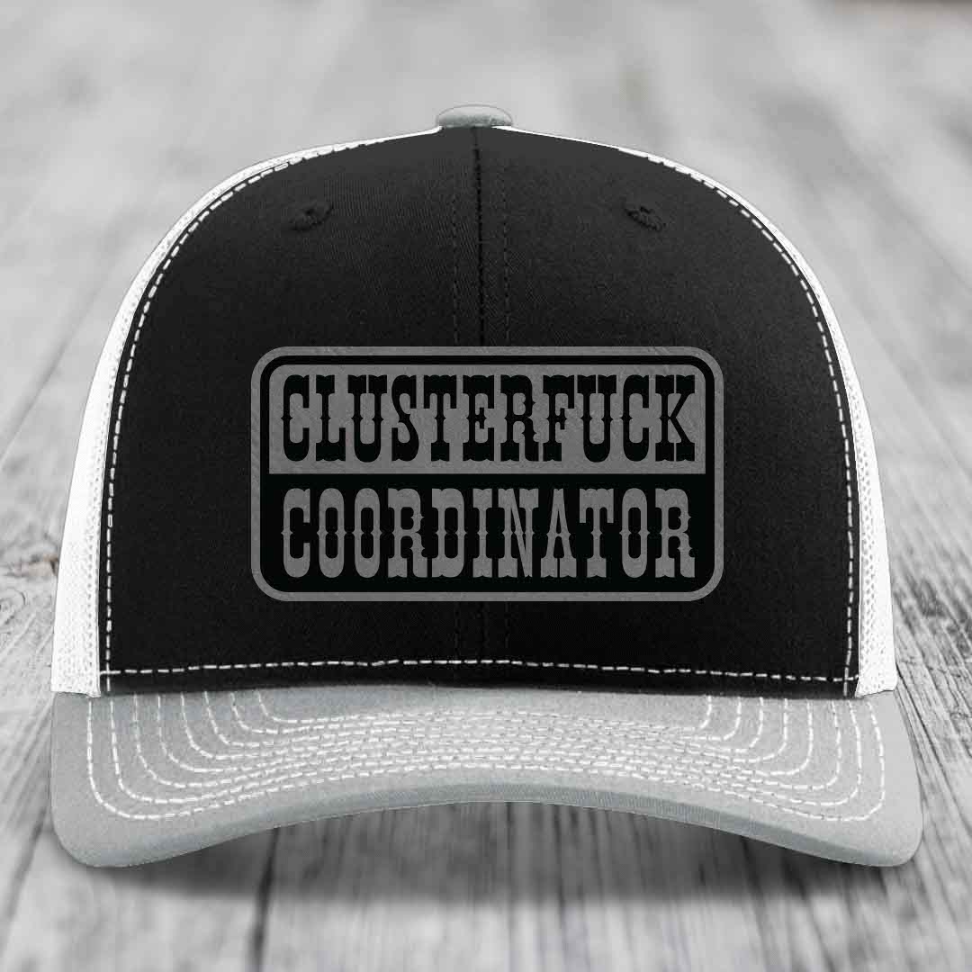 Black and white trucker hat with &