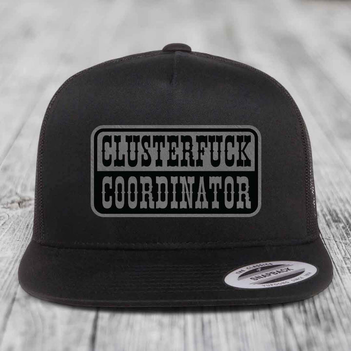Black snapback trucker hat with &