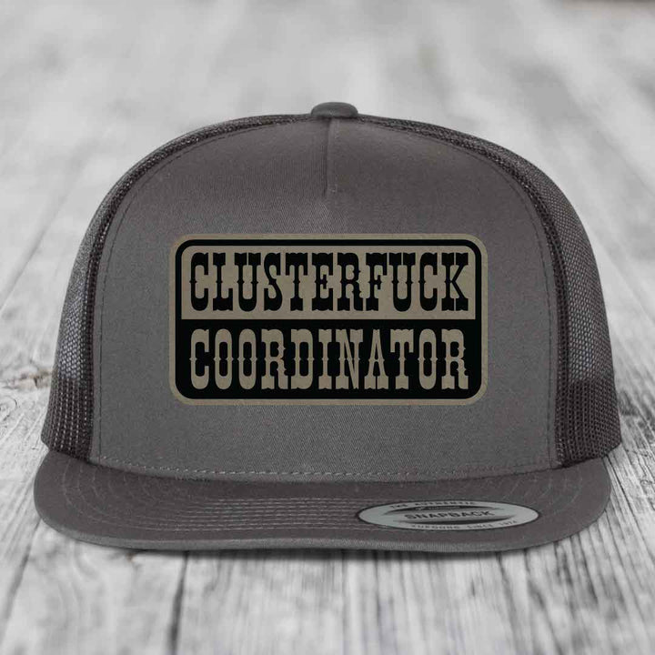 Cluster F*ck Coordinator - Leather Patch Hat - Light Brown to Black Patch - Yupoong 6006 Snapback Flatbill Hat