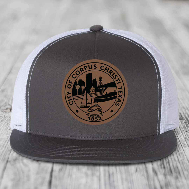 Corpus Christi Seal - Leather Patch Hat - Dark Brown to Black Patch - Yupoong 6006 Snapback Flatbill Hat