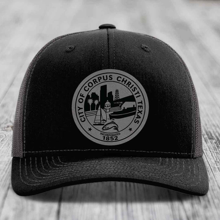 Corpus Christi Seal - Leather Patch Hat - Grey to Black Patch - Richardson 112 Snapback Trucker Hat