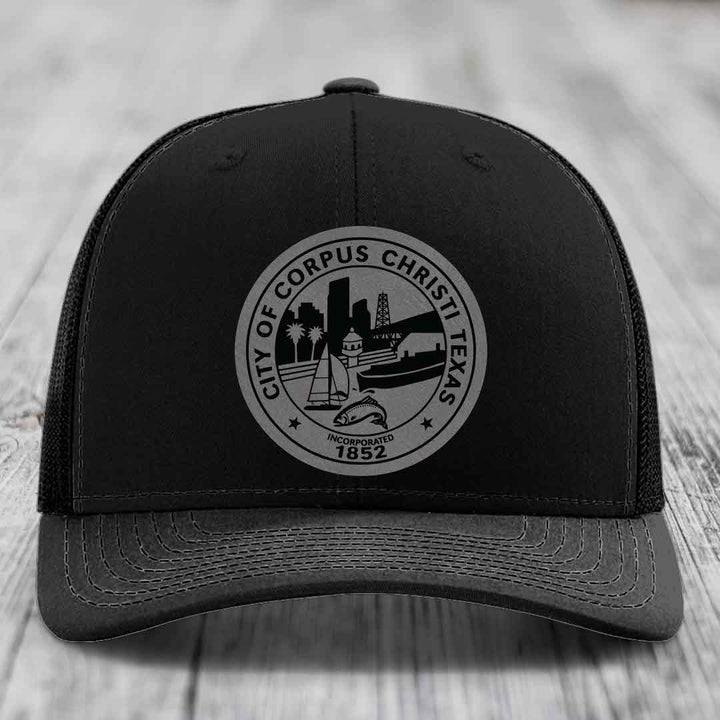 Corpus Christi Seal - Leather Patch Hat - Grey to Black Patch - Richardson 112 Snapback Trucker Hat