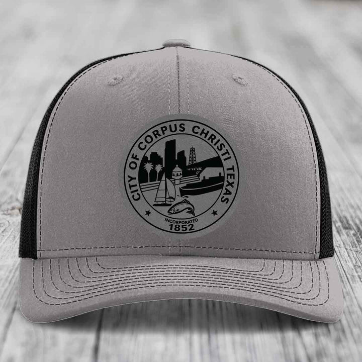 Corpus Christi Seal - Leather Patch Hat - Grey to Black Patch - Richardson 112 Snapback Trucker Hat