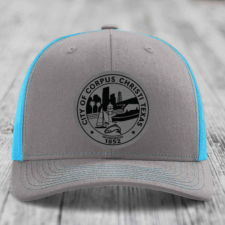 Corpus Christi Seal - Leather Patch Hat - Grey to Black Patch - Richardson 112 Snapback Trucker Hat