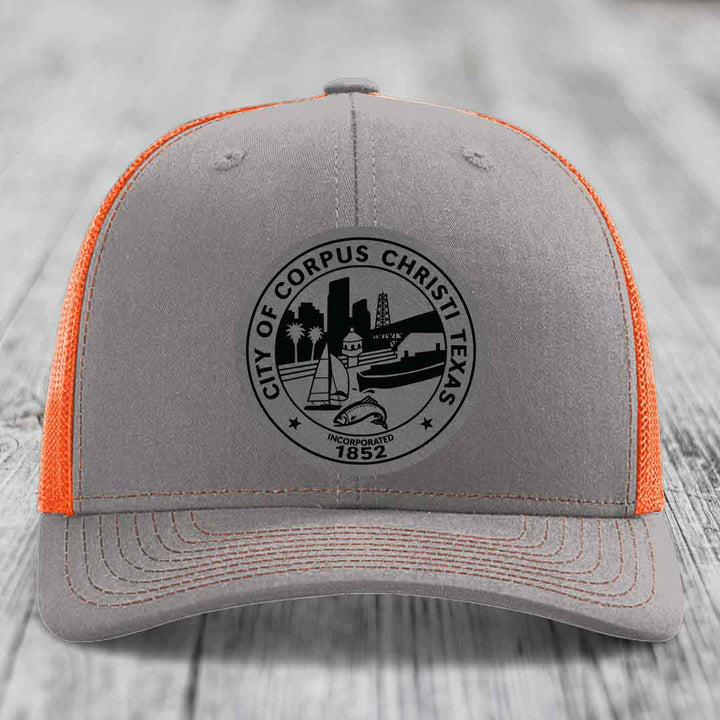 Corpus Christi Seal - Leather Patch Hat - Grey to Black Patch - Richardson 112 Snapback Trucker Hat