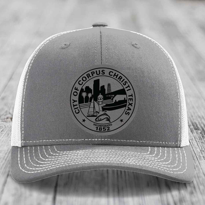 Corpus Christi Seal - Leather Patch Hat - Grey to Black Patch - Richardson 112 Snapback Trucker Hat