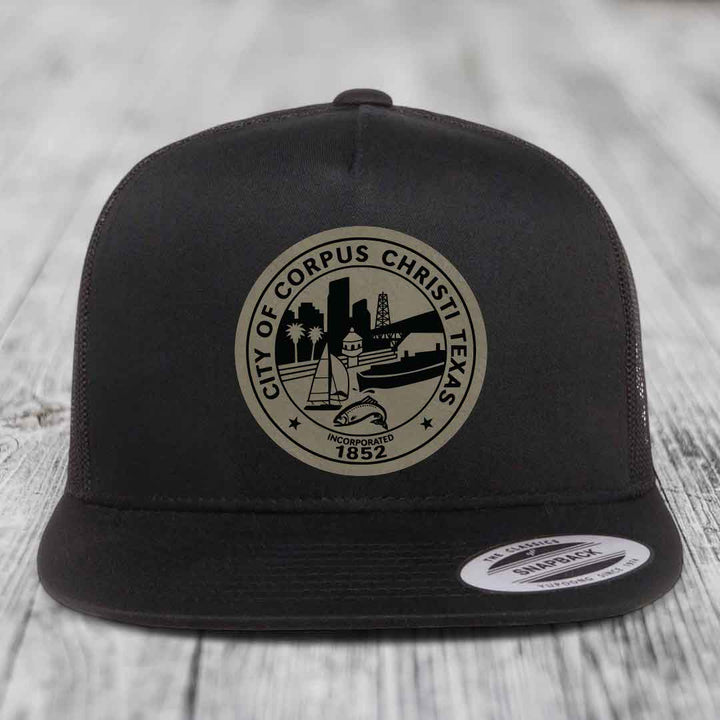 Corpus Christi Seal - Leather Patch Hat - Light Brown to Black Patch - Yupoong 6006 Snapback Flatbill Hat