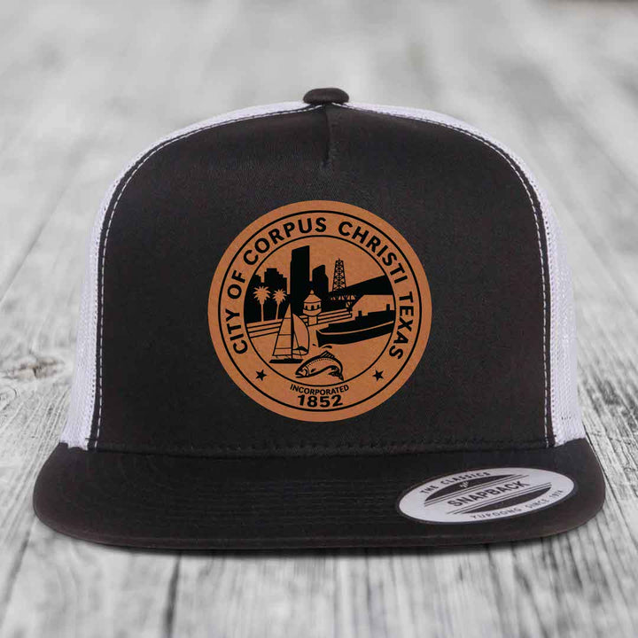 Corpus Christi Seal - Leather Patch Hat - Rawhide to Black Patch - Yupoong 6006 Snapback Flatbill Hat