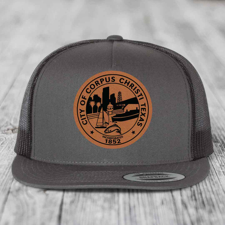 Corpus Christi Seal - Leather Patch Hat - Rawhide to Black Patch - Yupoong 6006 Snapback Flatbill Hat