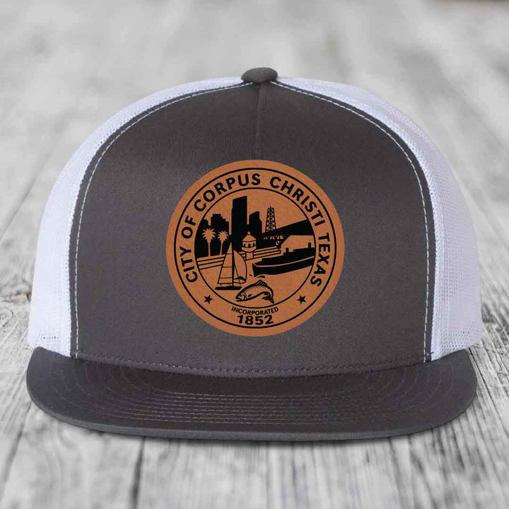 Corpus Christi Seal - Leather Patch Hat - Rawhide to Black Patch - Yupoong 6006 Snapback Flatbill Hat