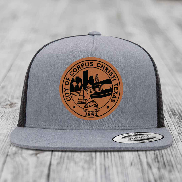 Corpus Christi Seal - Leather Patch Hat - Rawhide to Black Patch - Yupoong 6006 Snapback Flatbill Hat