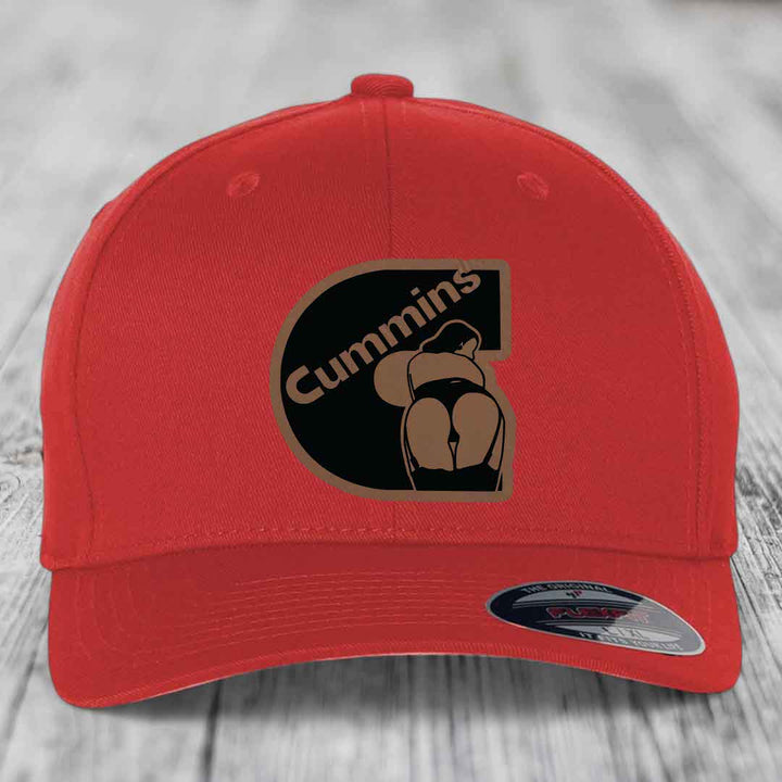 Black trucker hat with brown leather patch that says DAD in black letters.