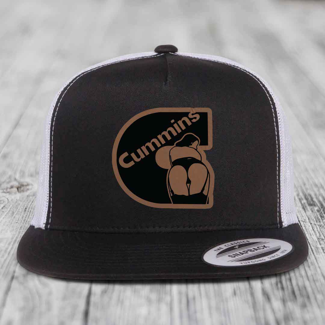 Grey trucker hat with brown Cummins logo patch featuring a stylized figure.