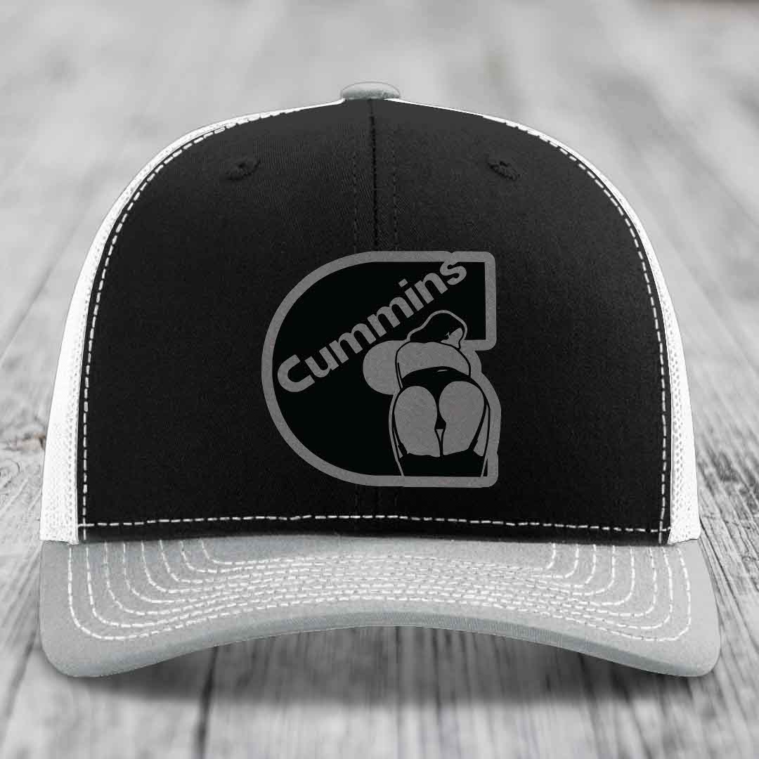 Brown trucker hat with white stitching and a black Cummins logo patch on front.