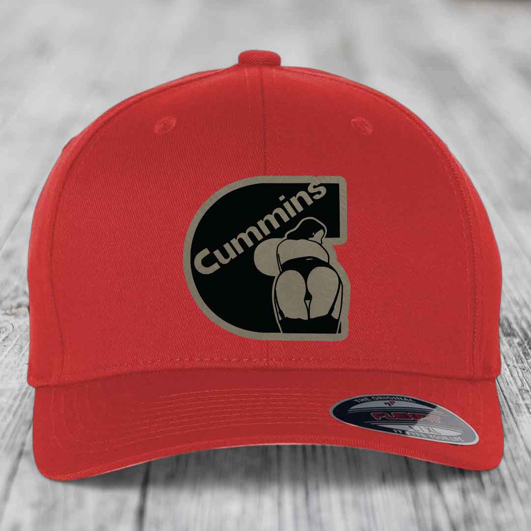 Red baseball cap with Cummins logo patch featuring a stylized &