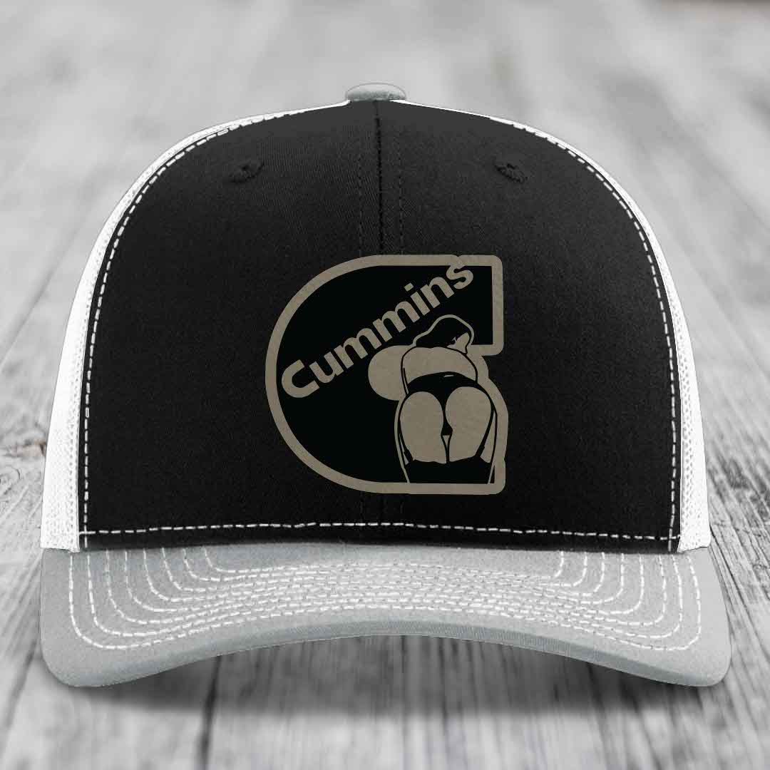 Brown trucker hat with white stitching and a black Cummins logo patch on front.
