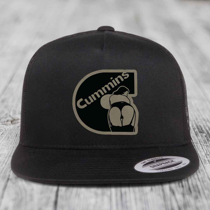 Black and white trucker hat with Cummins logo patch on front.