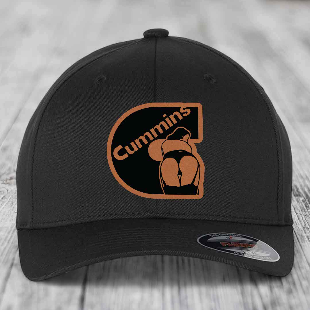 Black baseball cap with brown leather patch featuring &