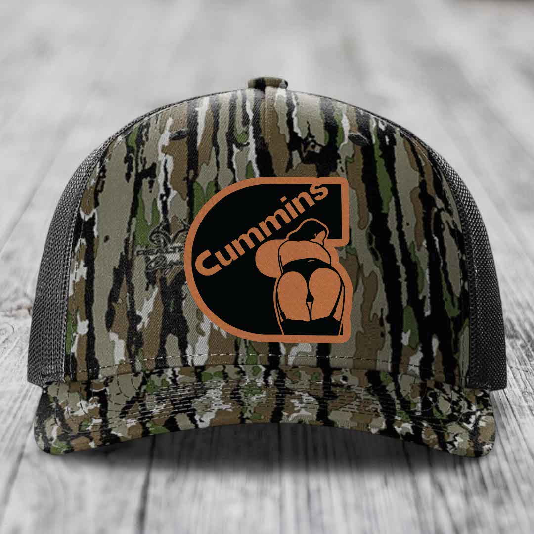 Black camouflage trucker hat with brown leather patch featuring &