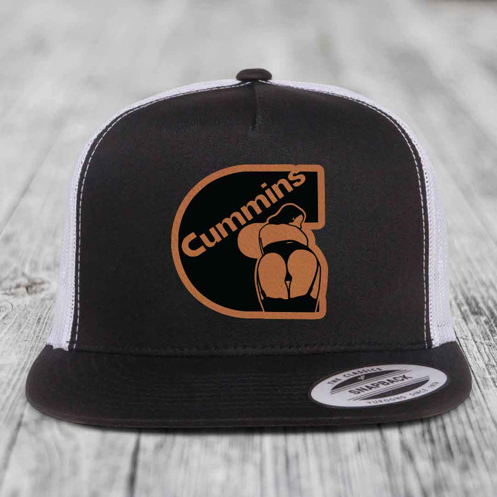 Grey trucker hat with brown leather patch featuring &