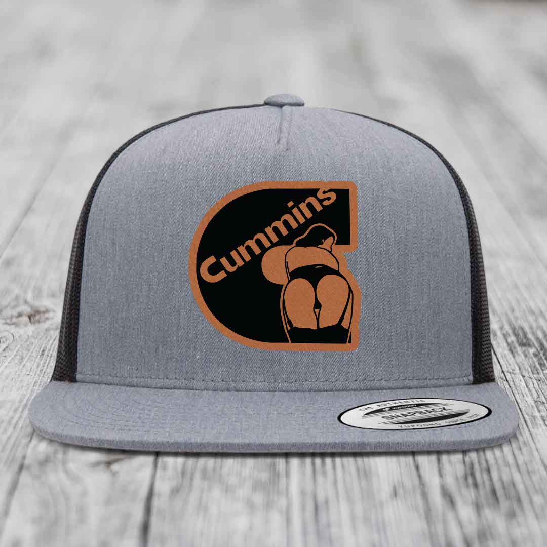 Grey trucker hat with brown and black Cummins logo patch on front.