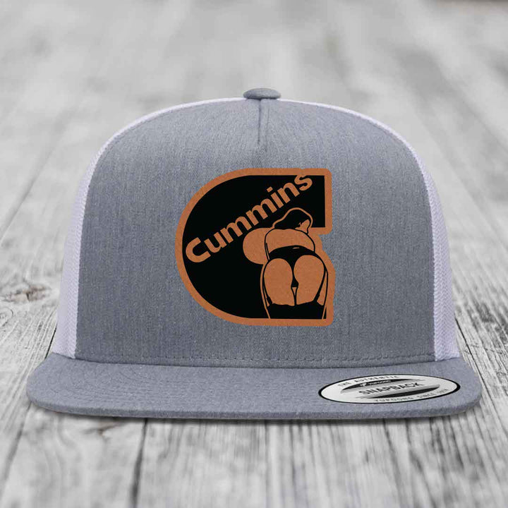 Grey front panel trucker hat with brown leather patch featuring &