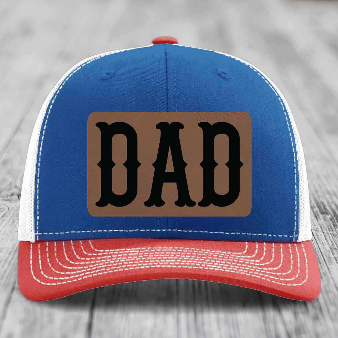 White trucker hat with brown leatherette patch featuring black &