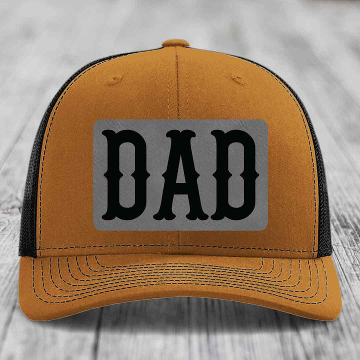 Grey trucker hat with black mesh back and &