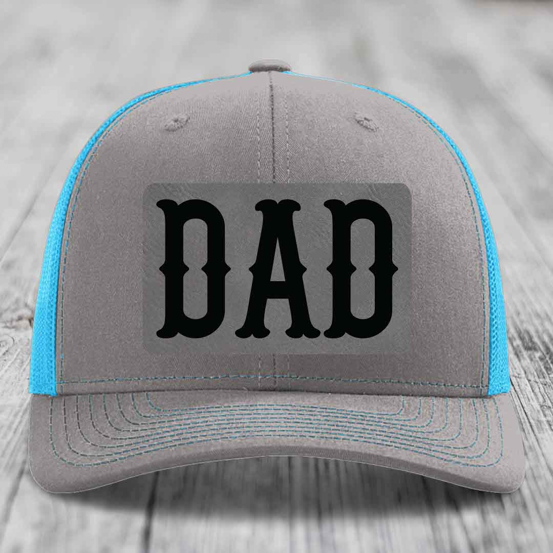 Grey trucker hat with neon green mesh and stitching, featuring a black &