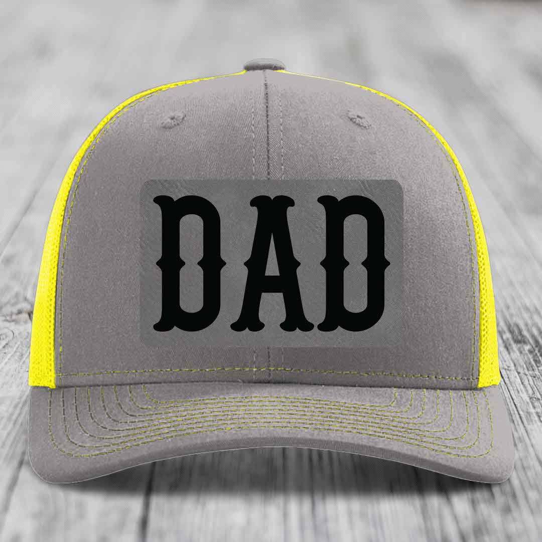 Brown trucker hat with beige mesh back and black &