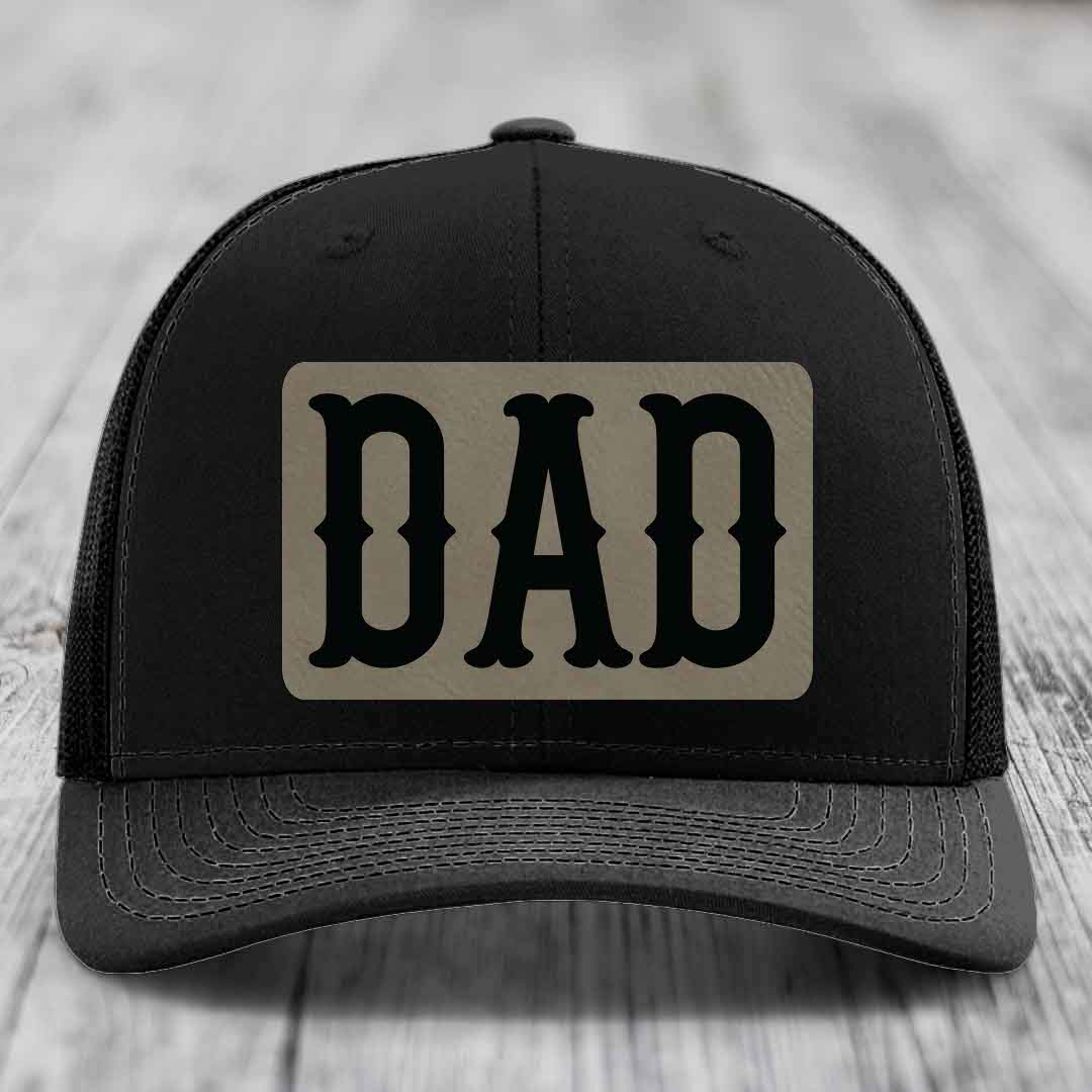 Tan and blue trucker hat with black &