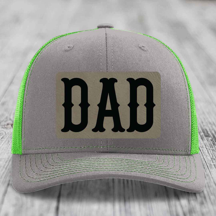 Grey trucker hat with orange mesh back and black &