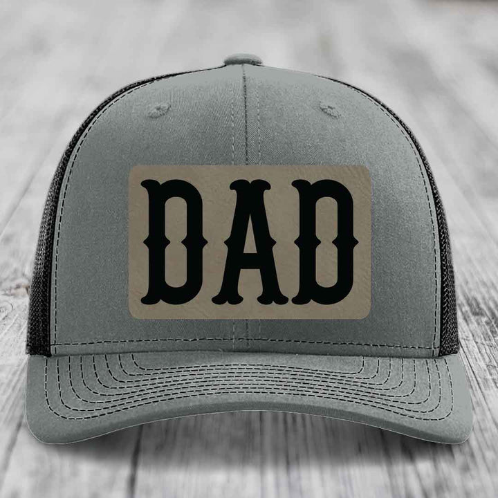 Grey trucker hat with white mesh back and black &