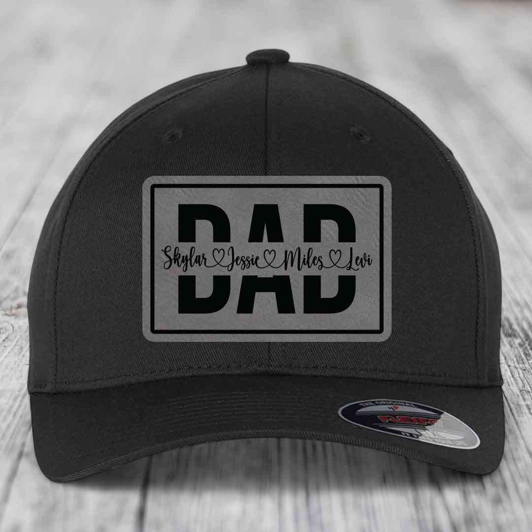 Black baseball cap with rectangular leatherette patch reading &