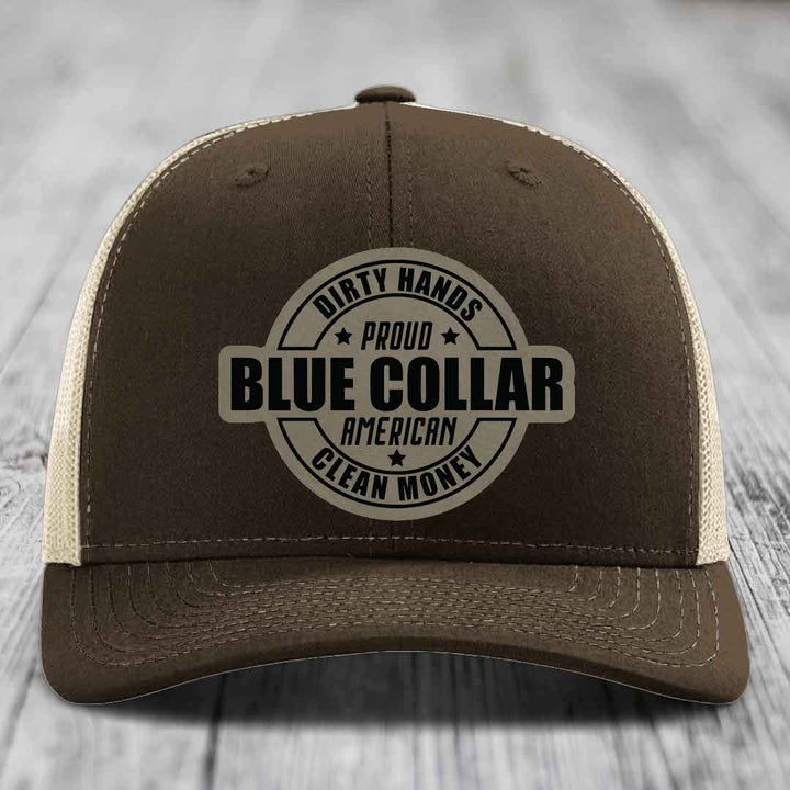 Green trucker hat with circular patch reading &