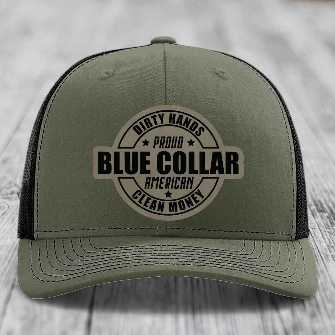 Dark blue trucker hat with a circular patch reading &