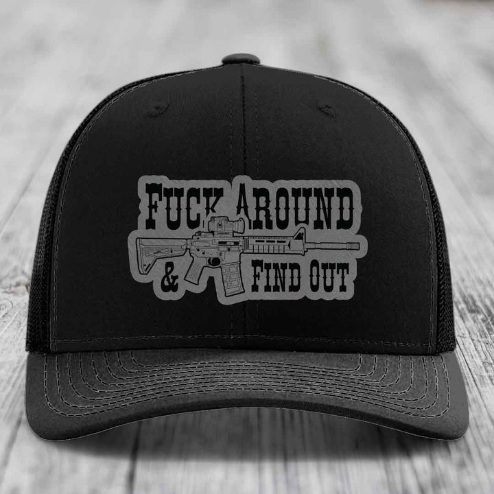 Black trucker hat with &