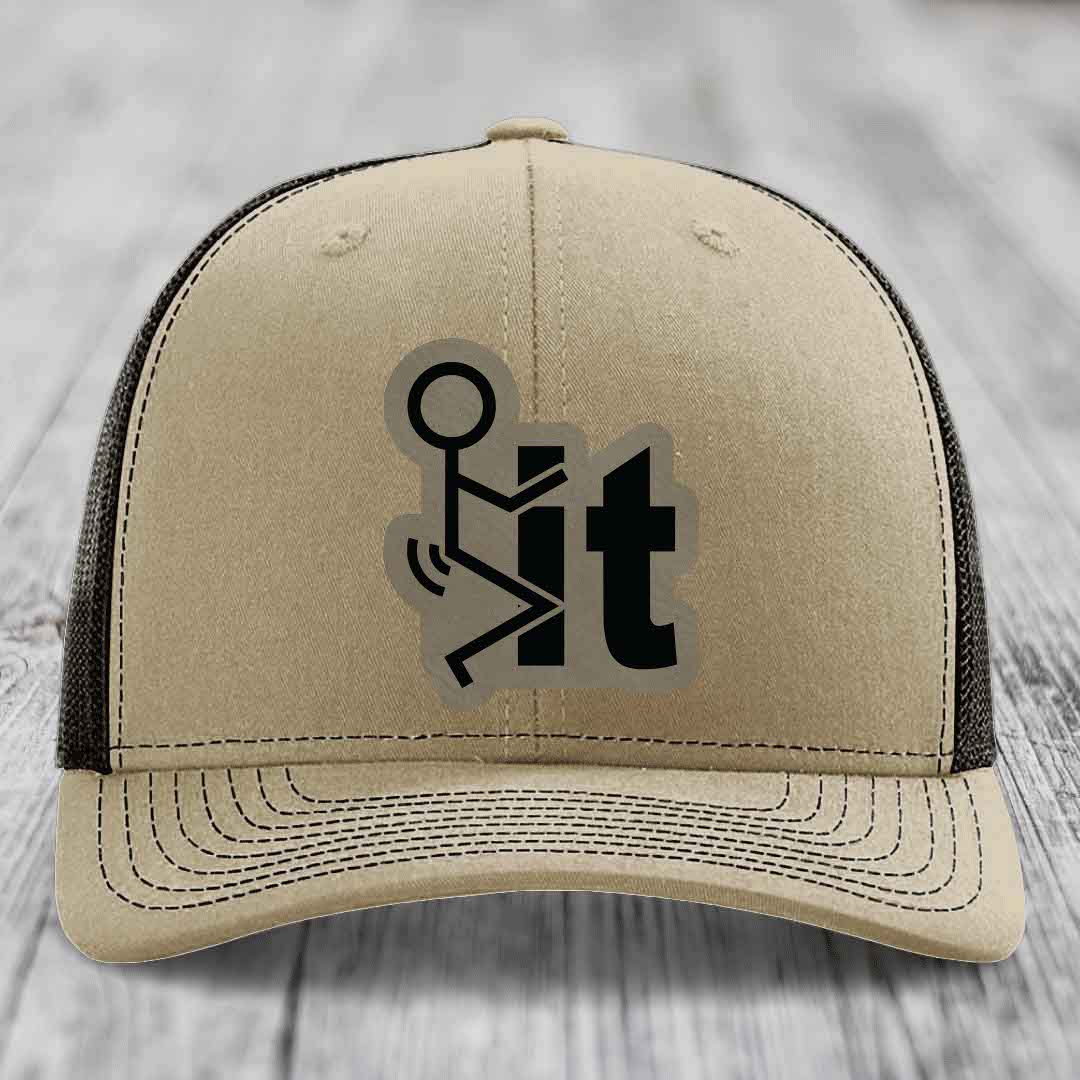 Beige trucker hat with black mesh back and a black &