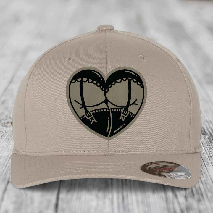 Heart Shaped Ass (Garter Belt) - Leather Patch Hat - Light Brown to Black Patch - Flexfit 6277 Fitted Hat