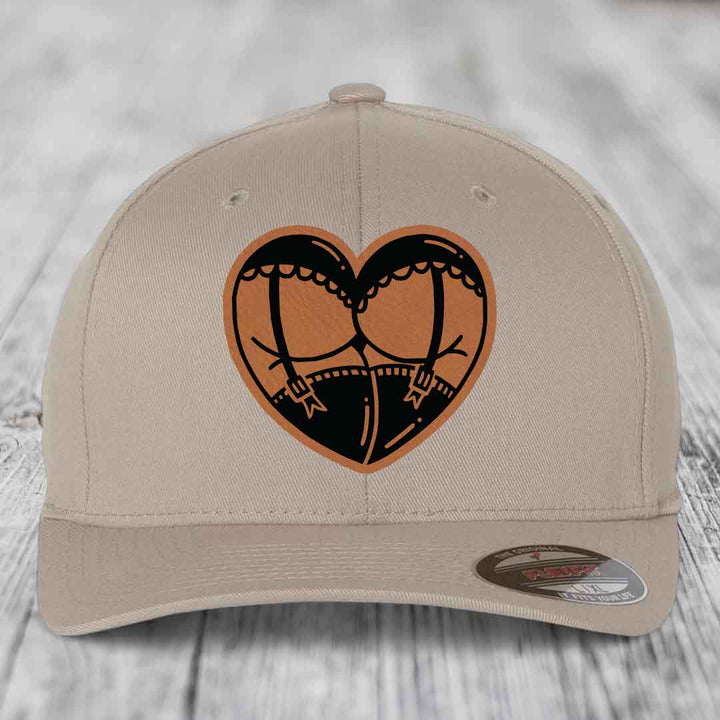 Heart Shaped Ass (Garter Belt) - Leather Patch Hat - Rawhide to Black Patch - Flexfit 6277 Fitted Hat