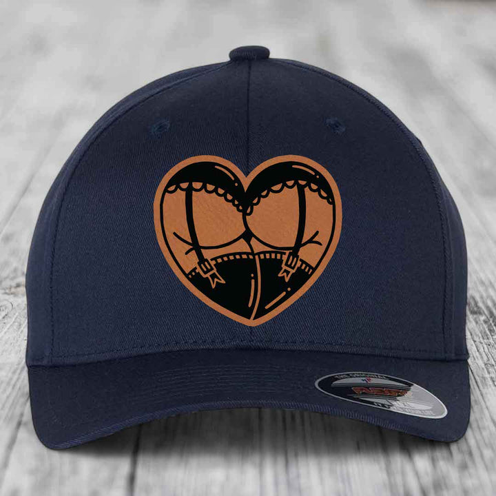 Heart Shaped Ass (Garter Belt) - Leather Patch Hat - Rawhide to Black Patch - Flexfit 6277 Fitted Hat