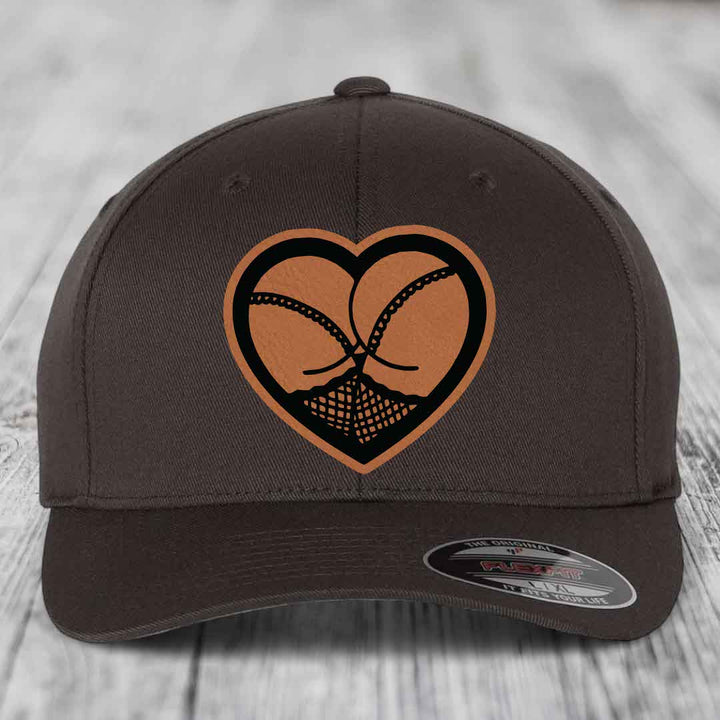 Heart Shaped Ass (Stockings) - Leather Patch Hat - Rawhide to Black Patch - Flexfit 6277 Fitted Hat