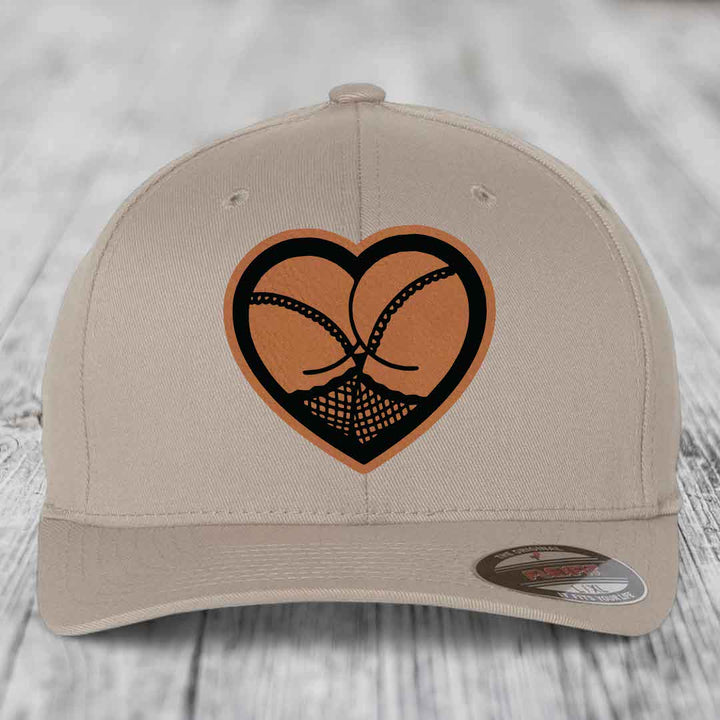 Heart Shaped Ass (Stockings) - Leather Patch Hat - Rawhide to Black Patch - Flexfit 6277 Fitted Hat
