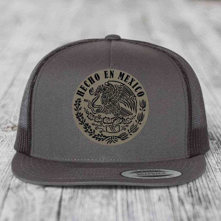Hecho En Mexico - Leather Patch Hat - Light Brown to Black Patch - Yupoong 6006 Snapback Flatbill Hat