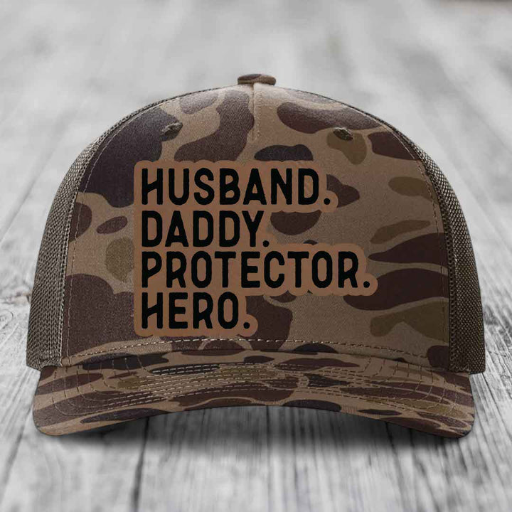 Husband Daddy Protector Hero - Leather Patch Hat - Dark Brown to Black Patch - Richardson 112PFP Snapback Trucker Hat