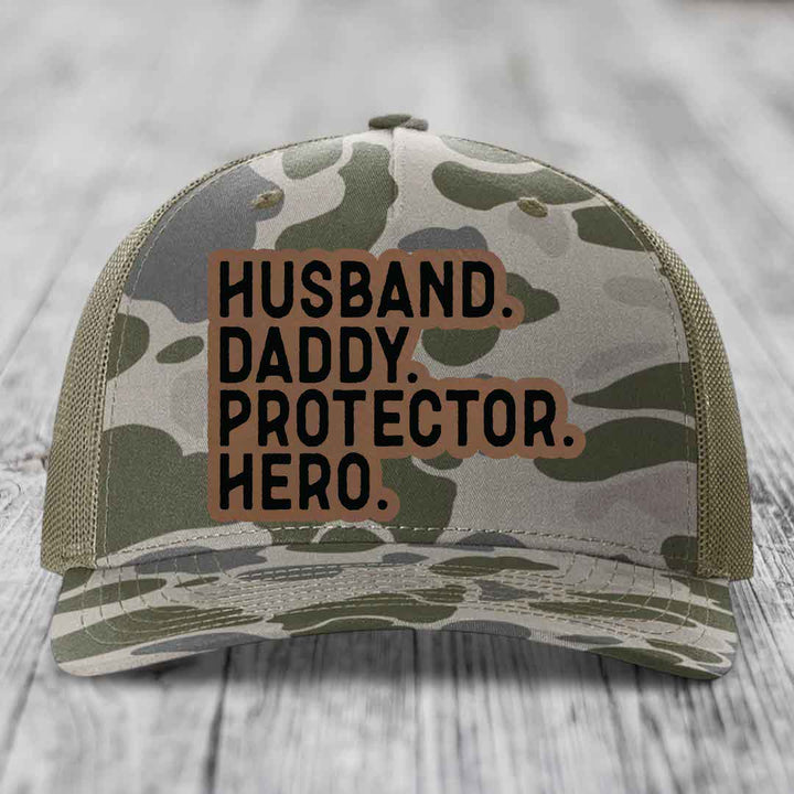 Husband Daddy Protector Hero - Leather Patch Hat - Dark Brown to Black Patch - Richardson 112PFP Snapback Trucker Hat