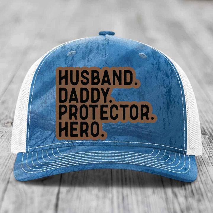 Husband Daddy Protector Hero - Leather Patch Hat - Dark Brown to Black Patch - Richardson 112PFP Snapback Trucker Hat